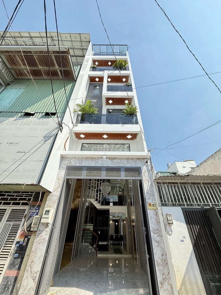 Nhà Phố 4m x 18m. 4 Tầng Có Thang Máy 1/ Hẻm nhựa 8m Đường Lâm Thị Hố