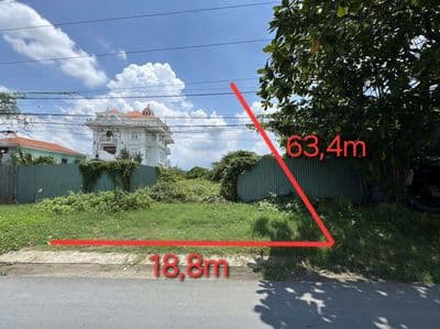 Bán đất mặt tiền đường QL1A, ngang 19m.