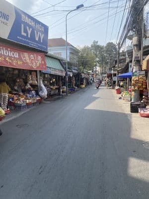 Bán lô đất ngay chợ , đương xe tải 777m(10x77) xây kho ,căn hộ dịch vụ