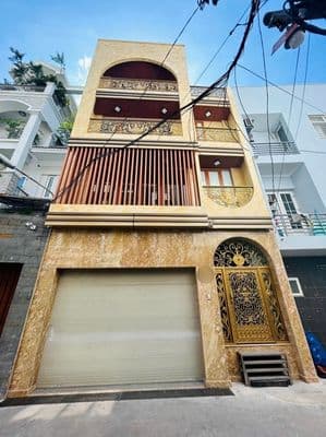 Nhà hxh huỳnh văn bánh_q.pn_7x20m, hầm lửng 3 lầu, thang máy.