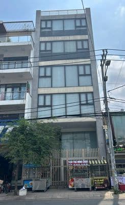 Tòa nhà hxh trường sơn_7,5x20m, hầm trệt 4 lầu suốt, đầy đủ cn.