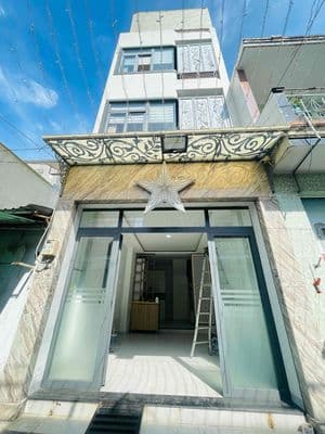 cho thuê nhà nguyên căn ngay chợ bình long -3 pn hẻm xe hơi