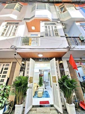 Nhà bán có sổ hồng 2 lầu, sân thượng gần cầu Phú Xuân
