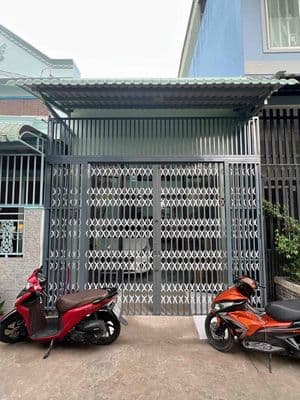 (Cafe 1%) Nhà lầu 2 mặt tiền trước sau - Đậu ô tô trong nhà