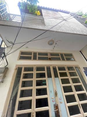 Nhà bán. BÌNH THẠNH SÁT MẶT TIỀN NƠ TRANG LONG 25 m2 -2 tầng ban công