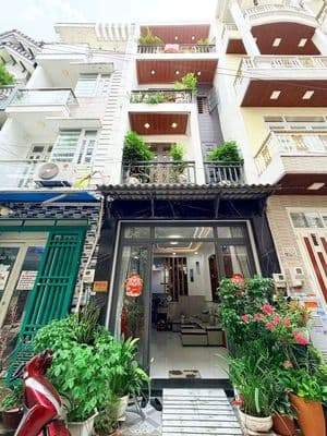 NHÀ 1 TRỆT 3 LẦ GỒM 5 NGỦ 1 PH THỜ 6WC XE HƠI ĐẬU CỬA