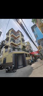 NHÀ 4 TẦNG GÓC 2 MT HXH 585 NGUYỄN THỊ THẬP