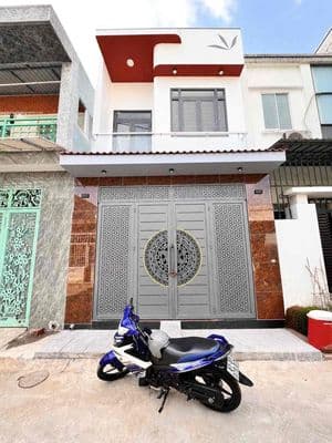 bán nhà trêt lầu mới tinh gần chợ Tân Long, phường dĩ an