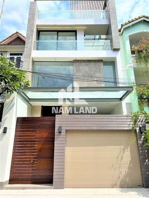 Nhà mới thiết kế hiện đại gara trệt 3 lầu 5 phòng lớn làm văn phòng