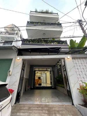 bán nha 4 tang be ngang 7 m tăng full noi that đường xe hơi