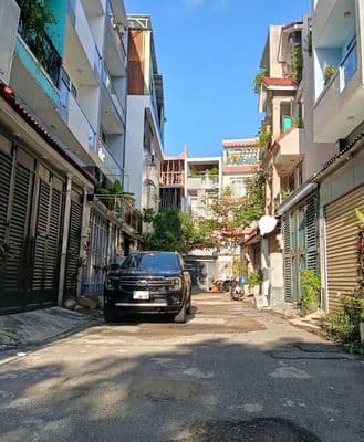 BÁN RẤT GẤP - 4 Tầng Nhà đẹp, Hẻm 2 XE HƠI thông ra Dương Quảng Hàm