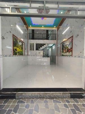Bán nhà gác lửng Tân Phước Khánh, sân xe hơi, gần trường học