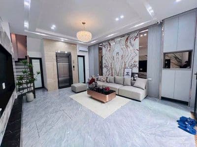 Bán nhà góc 2 mặt tiền gần Kim Ngưu, có thang máy, 15m ra ô tô