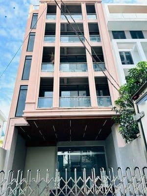Tòa nhà hxh nguyễn văn trỗi_7x22m_hầm trệt 4 lầu, thang máy.