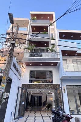 NHÀ THIẾT KẾ ĐẸP- 224E Nguyễn Thái Bình, P12, TB– 5x20m, 5 Tầng, 450m2