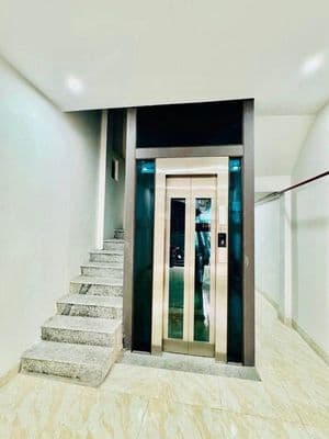 Bán nhà mặt ngõ Trương Định, ô tô, thang máy, dòng tiền 50tr/tháng