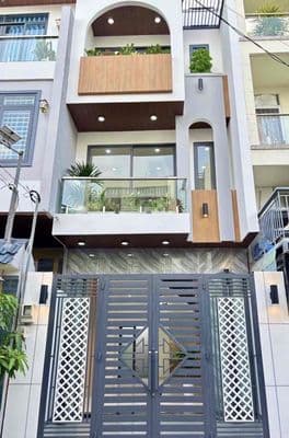 Nhà mới 3 tầng - 4pn - ngang 4.4m - đường ô tô thông - sau lưng chợ