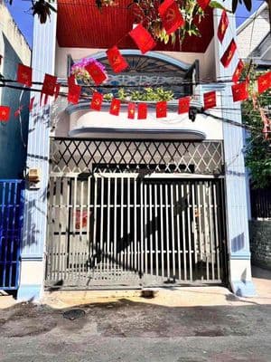 bán nhà trệt lầu gần trường học dĩ an 123 gần chợ dĩ an