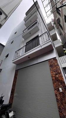 Tôi cần bán nhà hoàng hoa thám dt46m x 5 tầng thang máy ô tô đỗ cổng