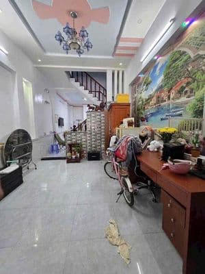 bán nhà trệt lầu đường thông 6 m gần cụm trường học Tân Đông Hiệp