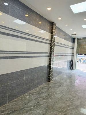 Nhà nguyên căn mặt tiền Bùi Văn Ba vừa kinh doanh vừa ở