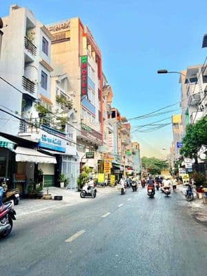 Nhà 1 Trệt 3 Lầu 4PN 4x18m Mặt Tiền Kinh Doanh Sầm Uất Tân Quy Q.7