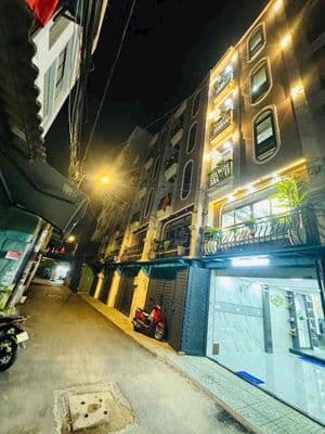 Bán nhà đẹp có thang máy đuờng xe hơi vào nhà