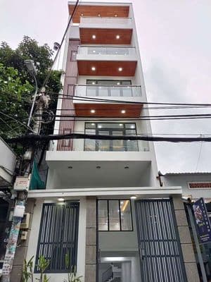 Nhà 1 Hầm 1 Trệt 3 Lầu ST 6PN 8WC 5x20m Mặt Tiền Đường Số Tân Quy