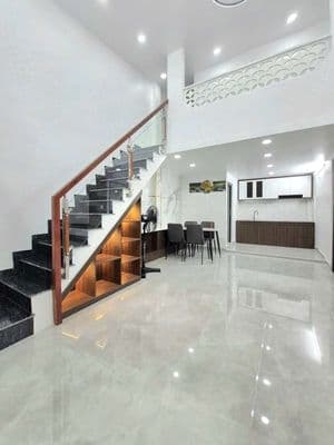 nhà 7x10m 1 lửng 3pn kế hẻm xe hơi Huỳnh Tấn Phát