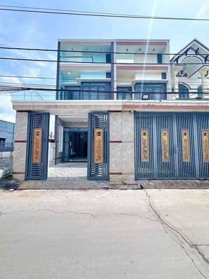 nhà 2 lầu khu dân cư Lê Phong Tân Bình