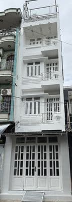 Cho thuê nhà nguyên căn mặt tiền lê niệm - 1 trệt 3 lầu sân thượng