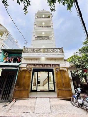 nhà mới đẹp măt tiền có thanh máy phù hợp kd, spa,p khám, cty 7pn 8wc
