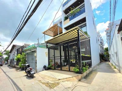 nhà 5x10m 2 lầu 4pn quận 7 5.69 tỷ bãi ô tô kế bên