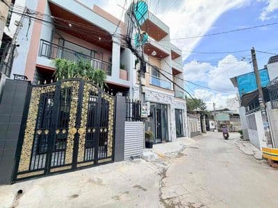 bán căn nhà lầu đường xe hơi thông phường bửu hoà. thổ cư 100%