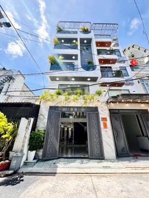 Nhà phố thang máy kính 5m ngang, Thới An, Q.12