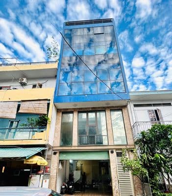 Tòa nhà ốp kính - 21a hoàng việt, p.4, tb, 6x20m, sẵn pccc, thang máy