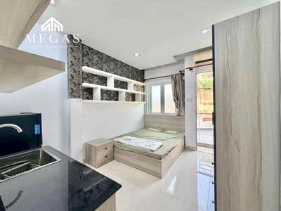 Nhà mới studio ban công thoáng - full nội thất - lê văn sỹ, giáp q3