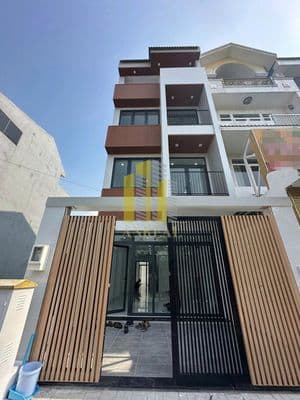 Cho thuê nhà mặt tiền sàn trống - 4 lầu thang máy giá 50 triệu