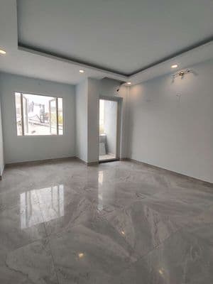 Nhà 2 lầu sân thượng 4pn 5wc xe hơi để trong nhà