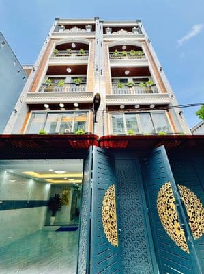 Nhà thang máy 4x15 1 lửng 3 lầu Quang Trung ngay kenh tham lương
