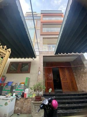 Toà nhà 1 trệt 4 lầu - có thang máy