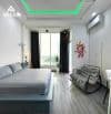 Pass phòng miễn tiền thuê tháng 7, có ban công full nội thất mặt tiền đường