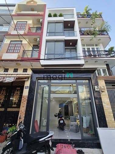 Bán nhà mới ở liền hẻm xe hơi đường Lạc Long Quân, 4 Tầng, 6 Phòng ngủ